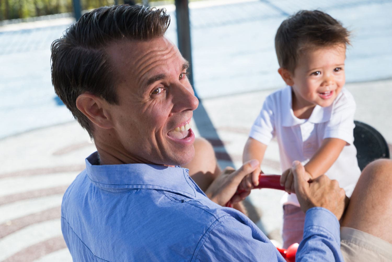 father and son playing