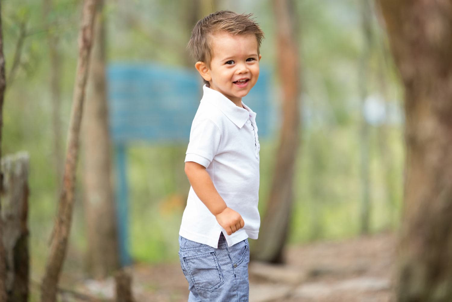 cute young boy at camera